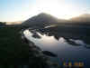 sunrise-cerro-cabrillo-reflects-in-estuary.jpg (83963 bytes)